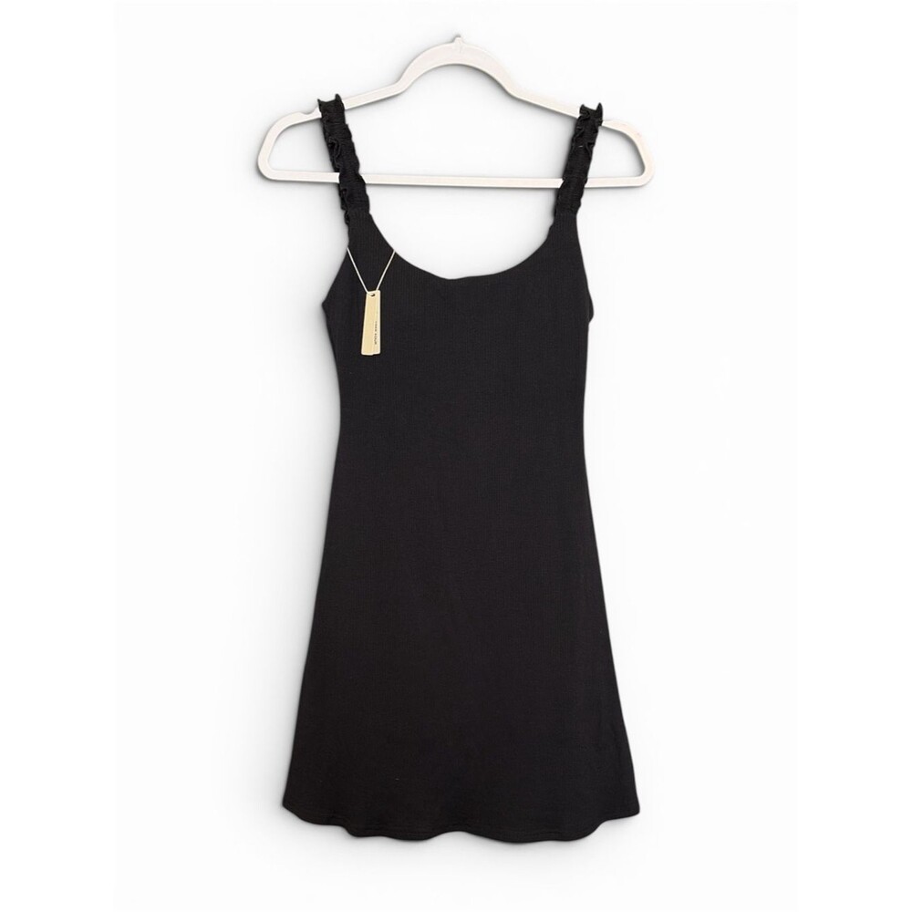 New OGL Black Ribbed black mini dress with attached jumpsuit. Size Small